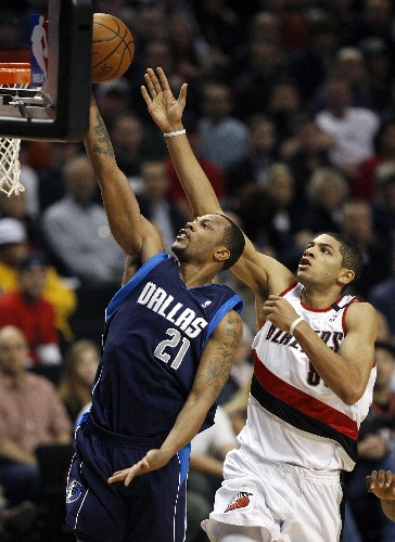  唐斯全能发挥森林狼客场力克开拓者队